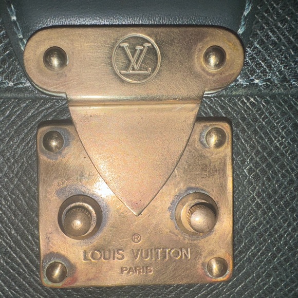 Louis Vuitton Tiaga Leather Clutch - Picture 11 of 12
